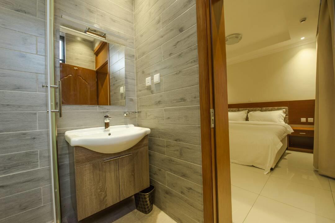 Lexor Apartments Кигали Экстерьер фото